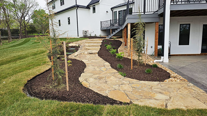 Natural stone sidewalk path by 4T Total Lawn